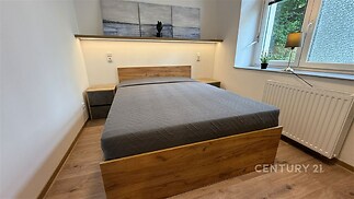 Ložnice u obývacího pokoje