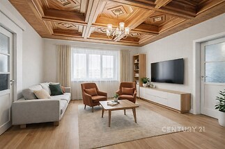 Světlý obývací pokoj s parketovou podlahou, dřevěný strop, moderní nábytek a velká okna poskytují příjemnou atmosféru.