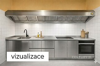 Moderní kuchyň s nerezovou kuchyňskou linkou, bílými dlaždicemi a vestavěnými spotřebiči; elegantní a snadno udržovatelný design.