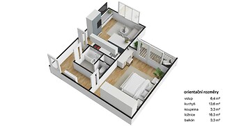Moderní kuchyň s parketovou podlahou a vestavěnými spotřebiči, vedle světlého obývacího pokoje s velkými okny a přístupem na balkon