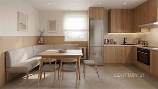 Moderní kuchyň s dřevěným obložením, světlým nábytkem a vestavěnými spotřebiči, dlažba na podlaze a velkým oknem zajišťujícím přirozené světlo.