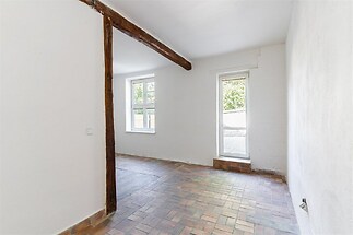 Bytová jednotka se zahrádkou 1+kk