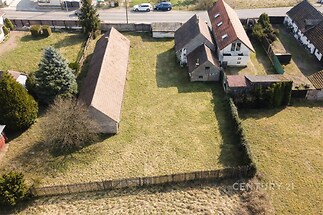 Pohled na nemovitosti (částečně AI)