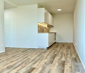 místnost s kuchyňským koutem