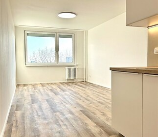 místnost s kuchyňským koutem