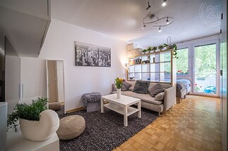 Obývací pokoj se vstupem na balkon
