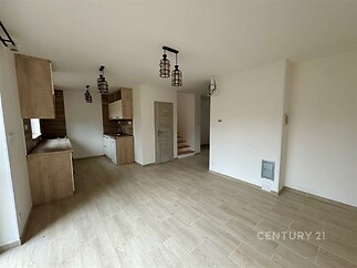 obývací pokoj s kuchyňsým koutem