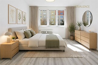 Prostorná ložnice s parketovou podlahou, velkými okny a moderním nábytkem. Neutrální tóny a minimalistický design vytvářejí světlý prostor.