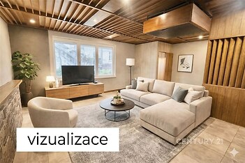 Světlý obývací pokoj s moderním designem, obsahující parketovou podlahu a velká okna, které dodávají prostoru vzdušnost a eleganci.