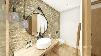 Koupelna s kameninovou stěnou, moderní umyvadlem na dřevěné desce a stylovými svítidly, parketová podlaha vytváří útulný styl.
