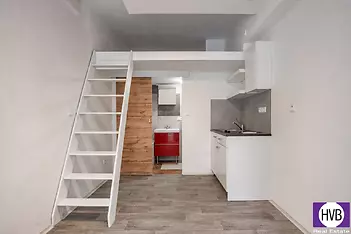 moderni-loft-s-kuchynkou-a-cervenou-umyvadlovou-skrinkou.png