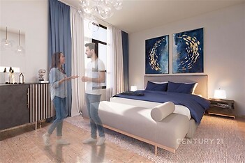 Světlá ložnice s parketovou podlahou nabízí moderní interiér, velká okna a stylový nábytek, což vytváří příjemnou atmosféru.